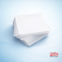 A stack of professional 2-ply white napkins in a 1/8 rectangular fold for restaurant table settings Ireland
